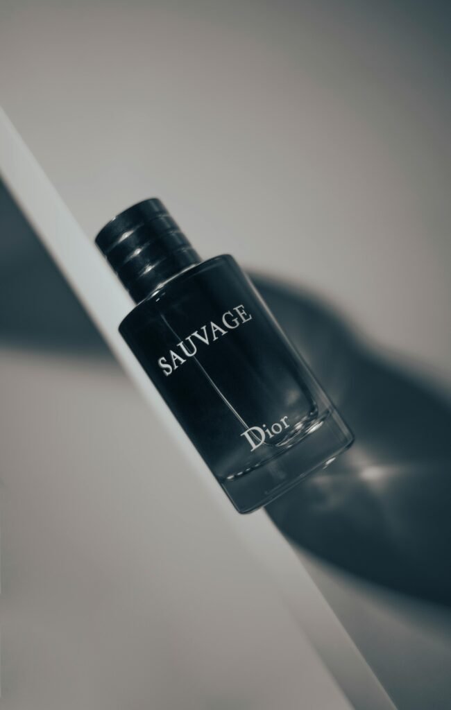 Stylish product shot of Dior Sauvage perfume bottle highlighting luxury and elegance on a white surface.